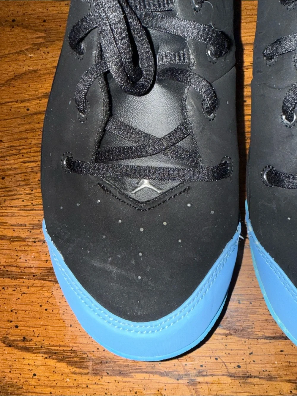 Kids Nike Melo 1.5 shoes black/university blue.